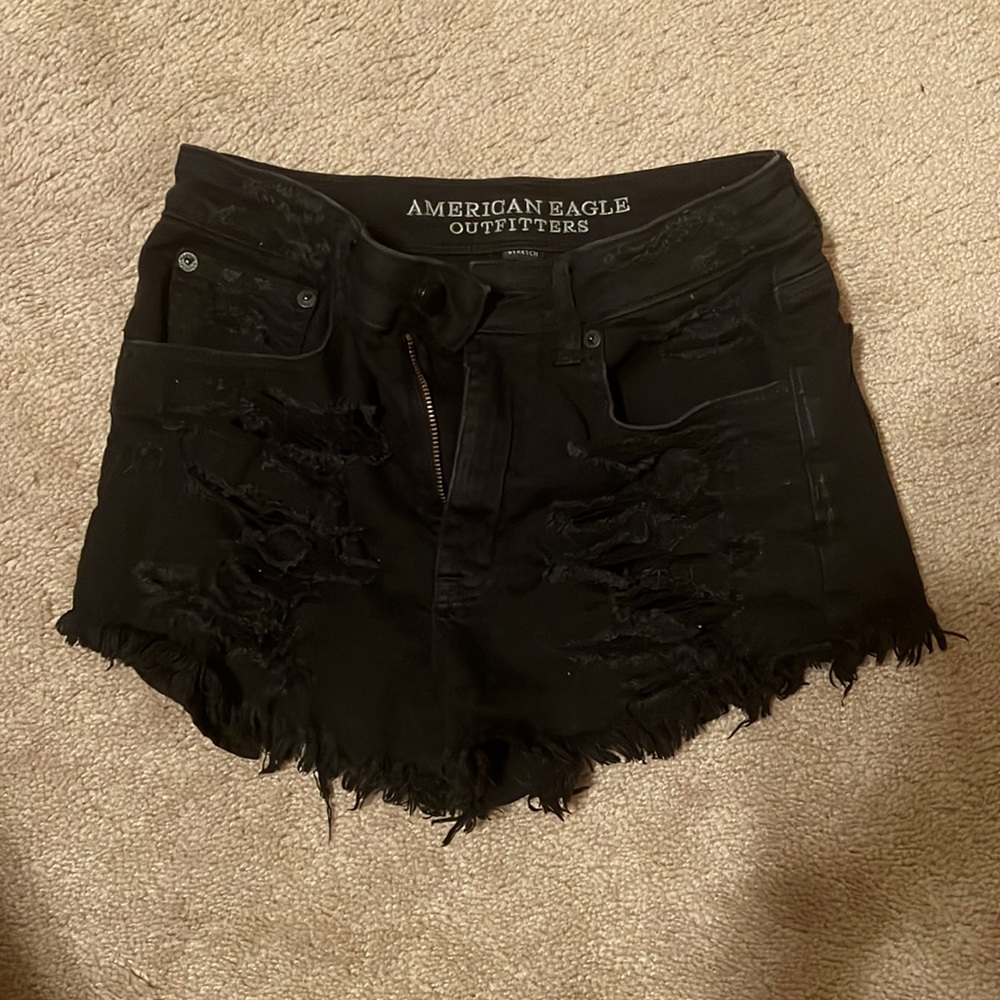 Distressed black jean shorts